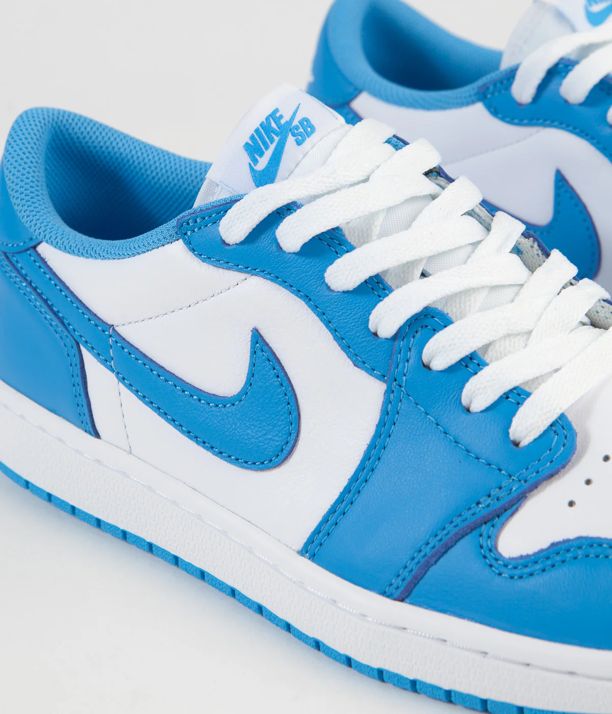 Nike SB x Air Jordan 1 Low UNC Shoes - Dark Powder Blue / Dark Powder Blue - White - Image 3